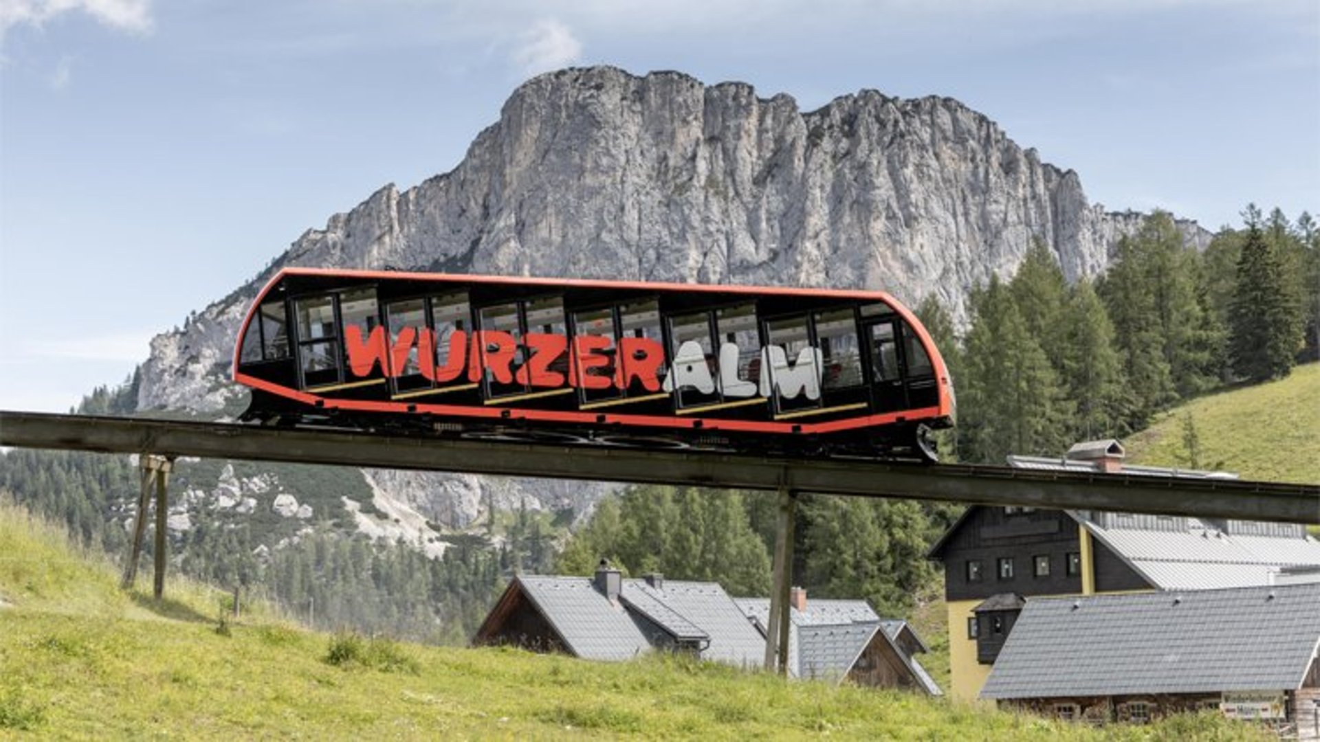 Wurzeralm funicular | Photo: HIWU / Daniel Hinterramskogler View of the Wurzeralm funicular and behind it the Stubwies.